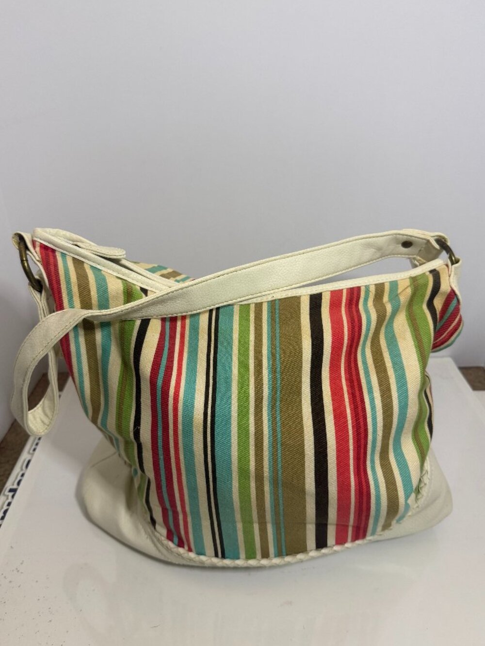 Off-white purse with colored stripes